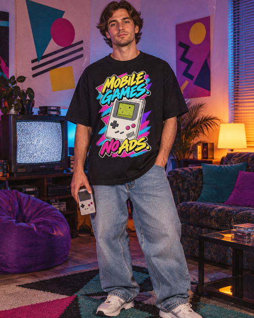 Lifestyle photo: Mobile Games No Ads T-Shirt | Retro Handheld Gaming Nostalgia on a Black T-shirt (Color: Black)